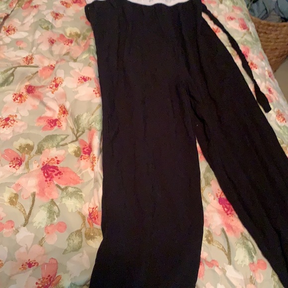 black and white jumper with a little bit of silver on the white - Picture 3 of 4